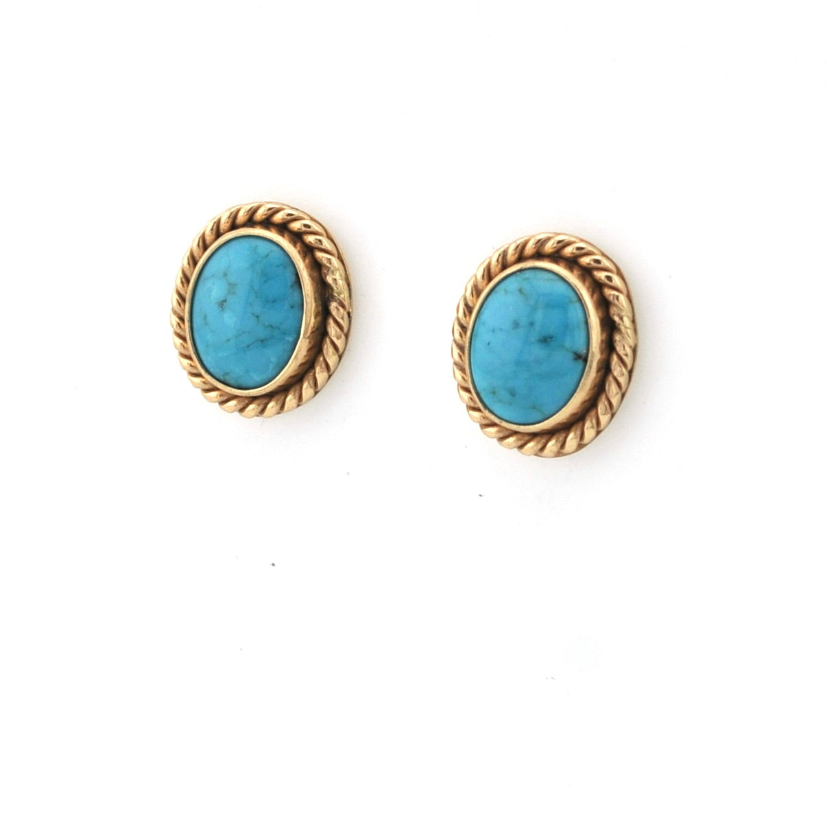 Pair of gold earrings with turquoise stones on a white background
