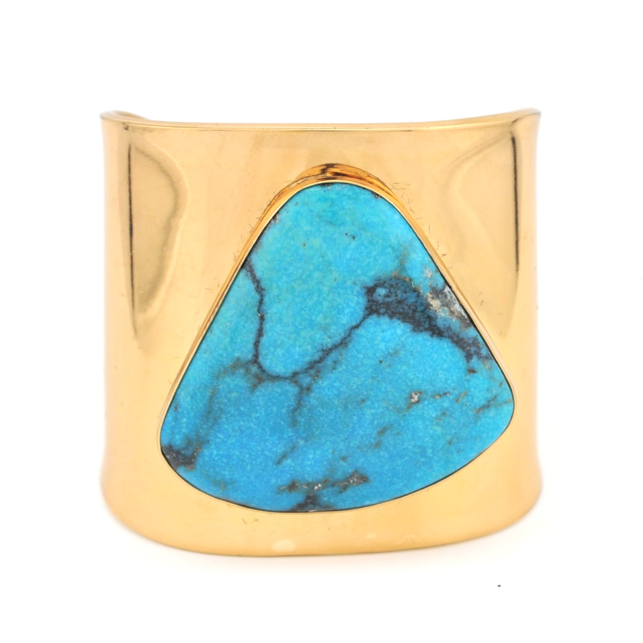 Gold cuff bracelet with a turquoise stone on a white background