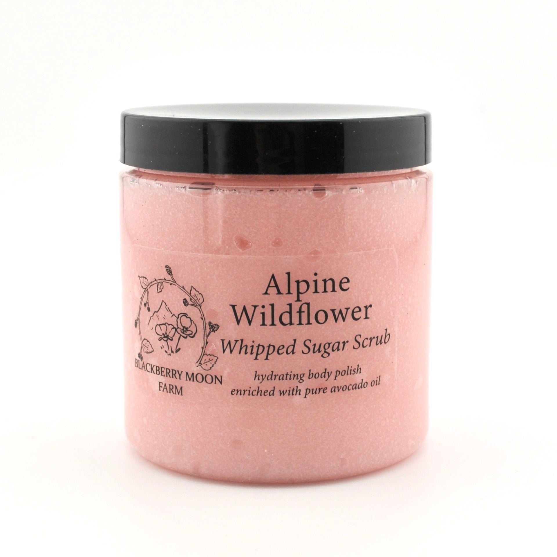 Jar of Alpine Wildflower Whipped Sugar Scrub with black lid on a white background