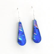 Dichroic Glass Rainbow Blue Tear Earrings on white background.