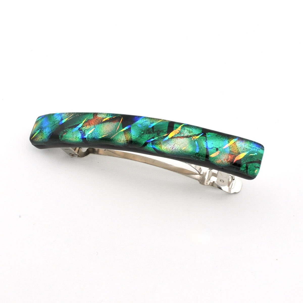 A silver-toned hair barrette with a glossy, rectangular iridescent green and blue glass inlay featuring orange and yellow reflective flecks, shown on a plain white background.