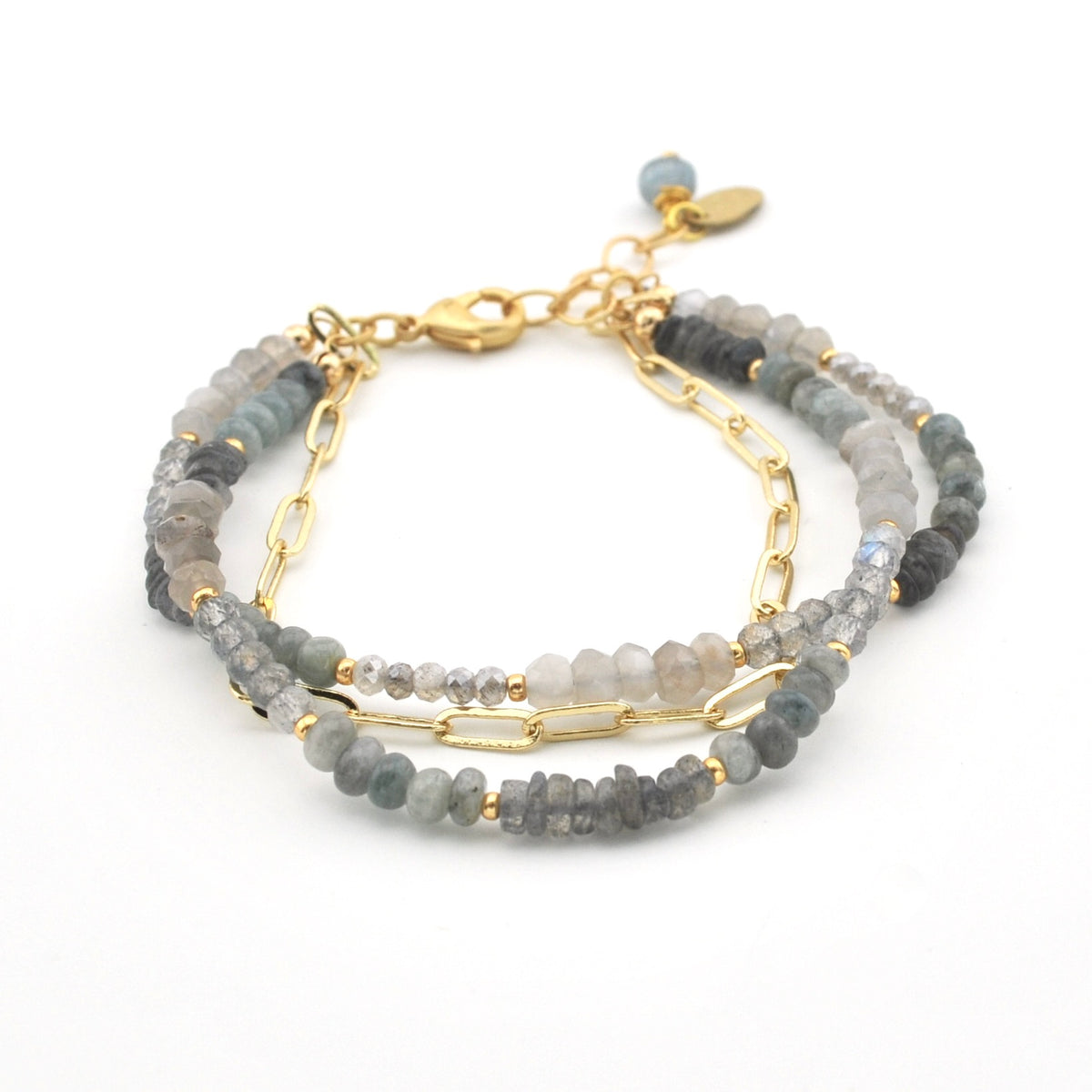 A double-strand beaded bracelet with gray and blue-green labradorite beads, gold spacer beads, a gold paperclip chain, and a gold lobster clasp, shown on a white background.