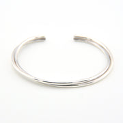 Silver bangle on a white background