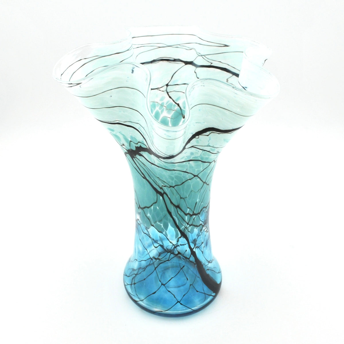 A hand-blown glass vase with a flared, ruffled top and a bulbous base, featuring a color gradient from light aqua at the top to bright blue at the bottom, with black and dark gray vein-like lines throughout.