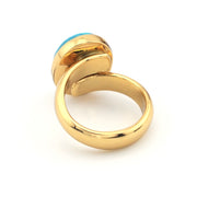 Gold ring on white background