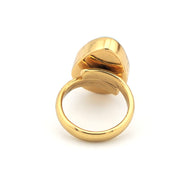 Gold ring with a unique design on a white background