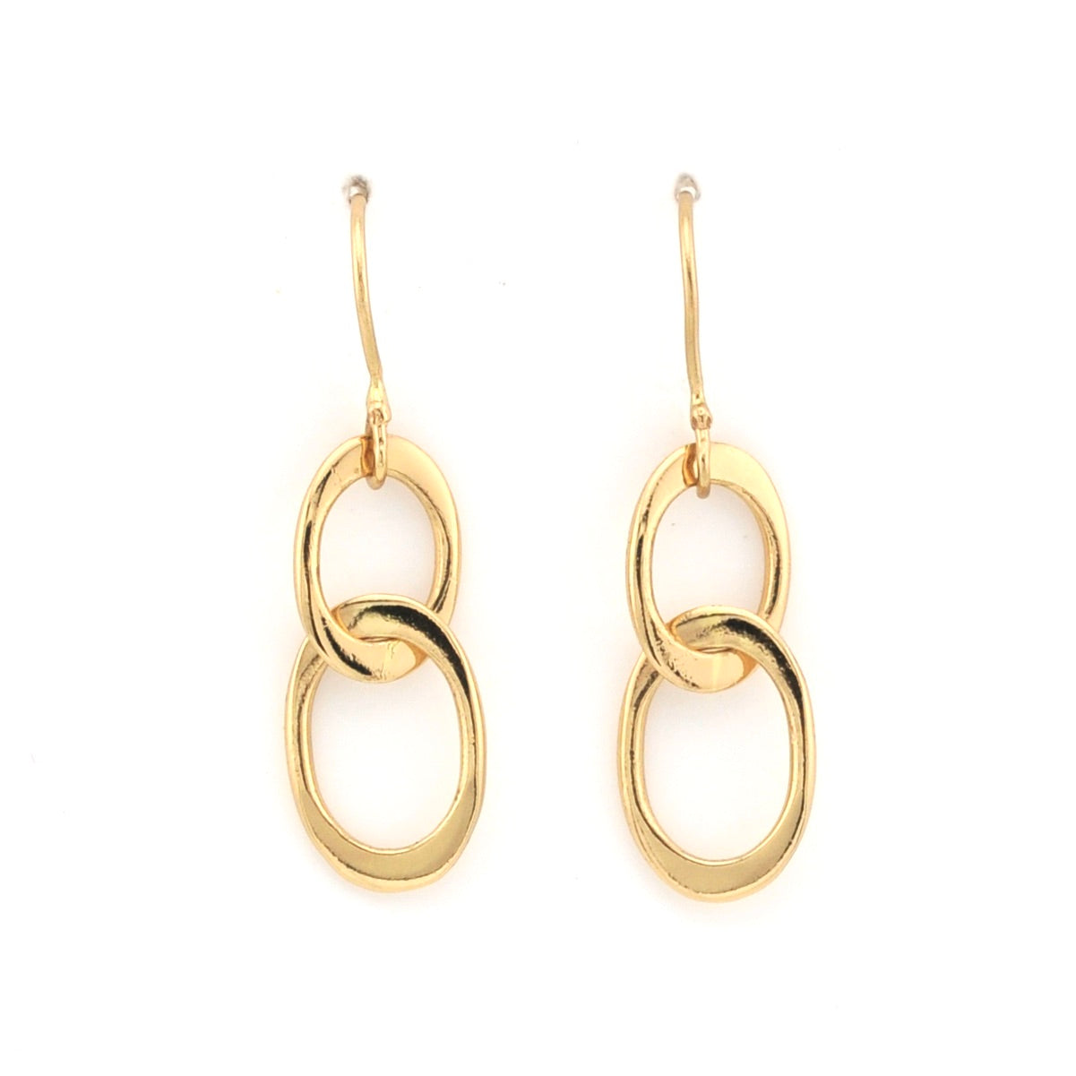 Gold hoop earrings on a white background