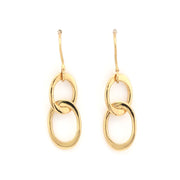 Gold hoop earrings on a white background