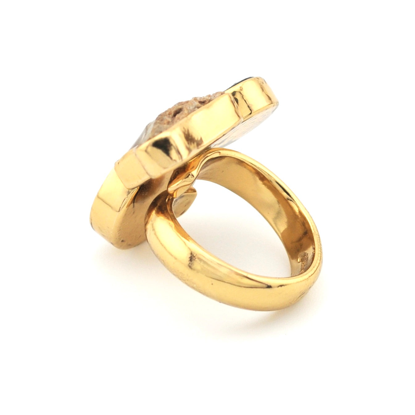 Gold ring on a white background