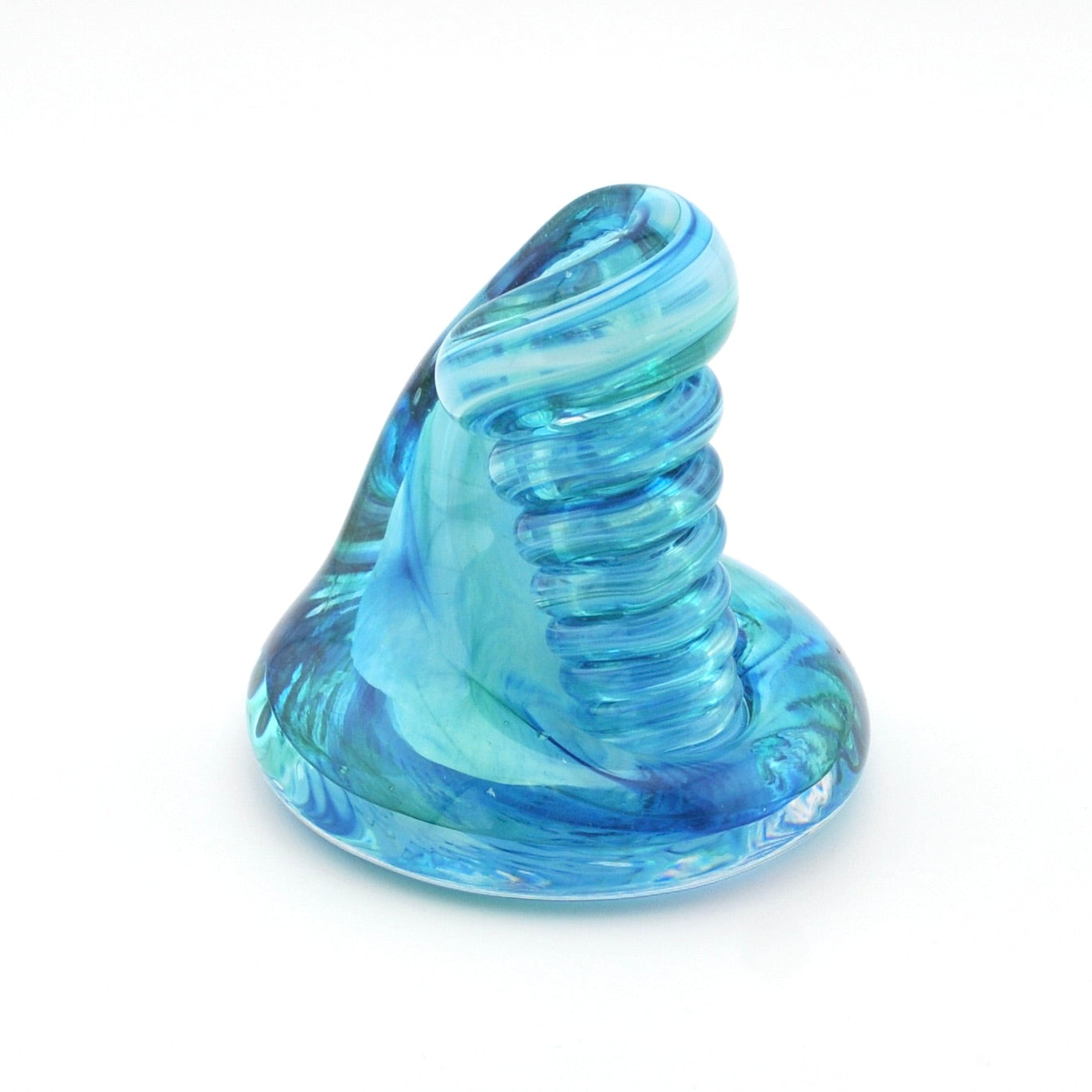 Blue and green glass sculpture on a white background