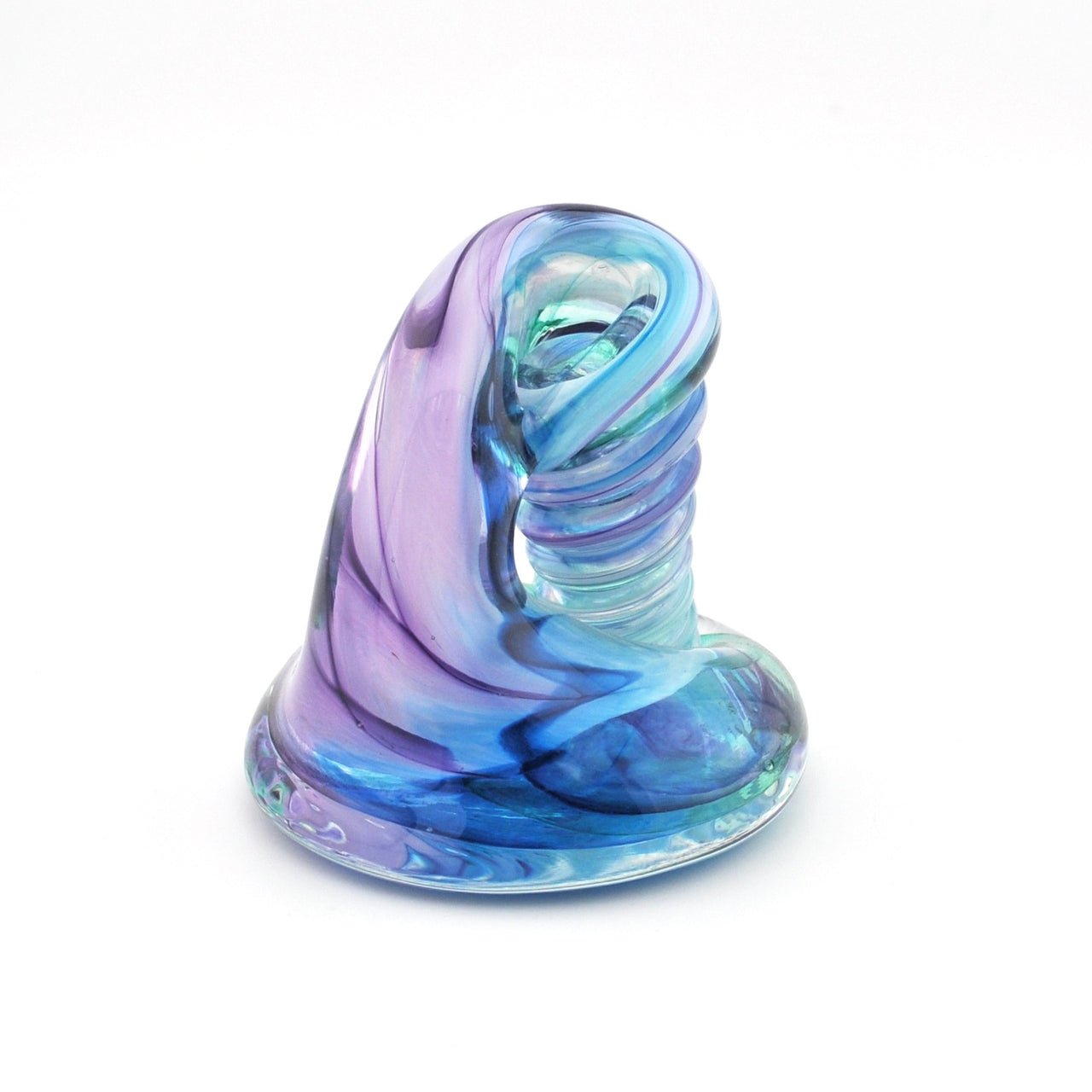 Glass sculpture with blue and purple swirls on a white background