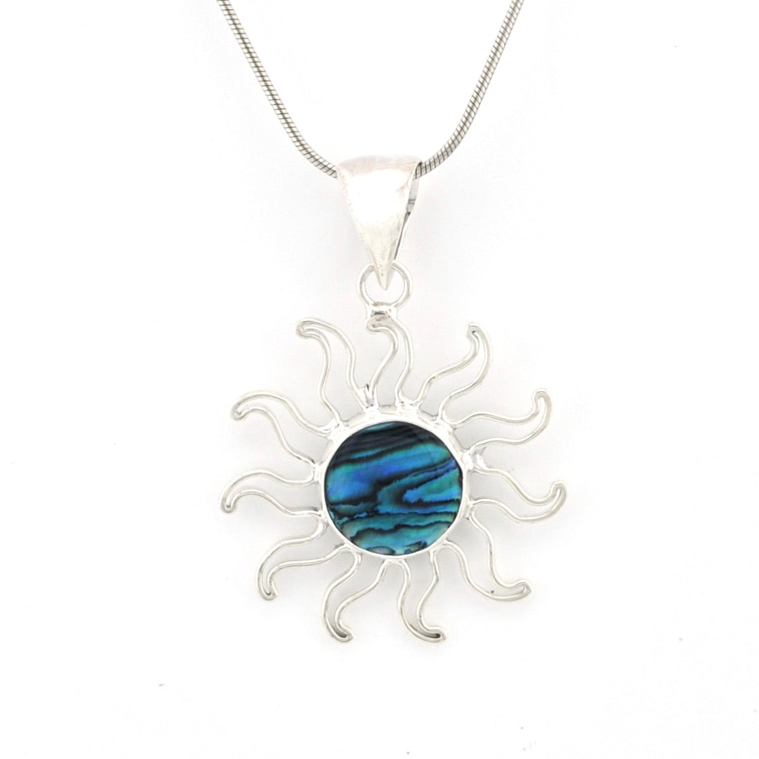 Silver sun-shaped pendant with a blue center on a white background