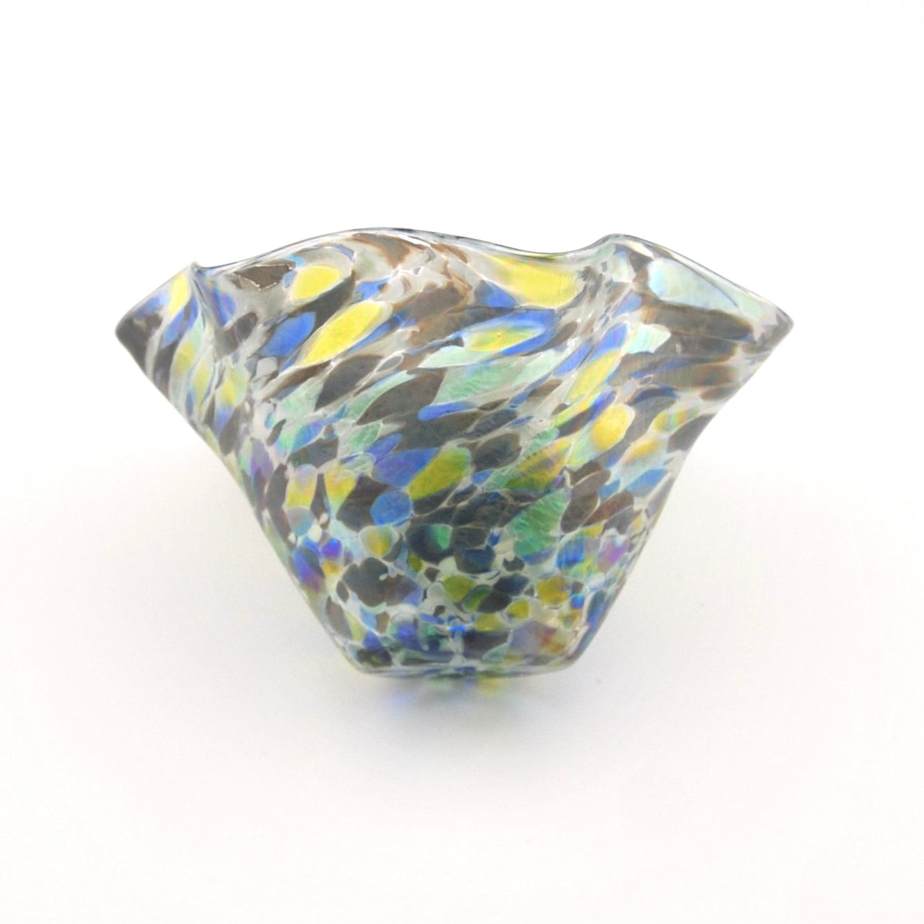 Multicolored glass bowl on a white background