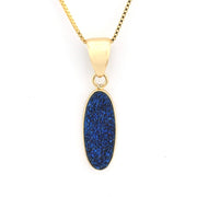 Gold necklace with a blue pendant on a white background