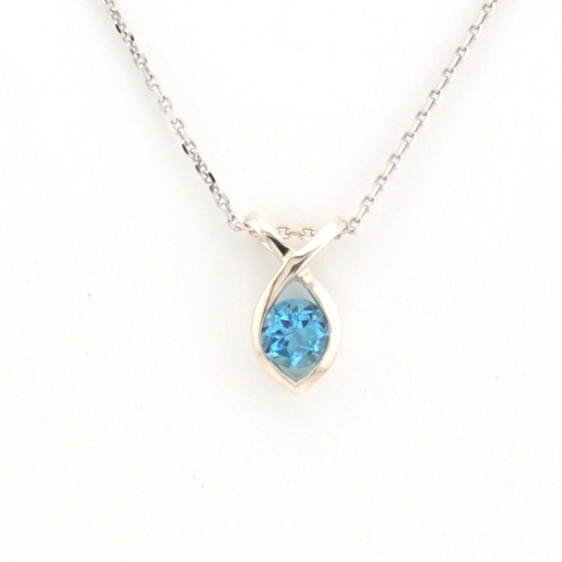 Teardrop-shaped blue gemstone necklace on a white background