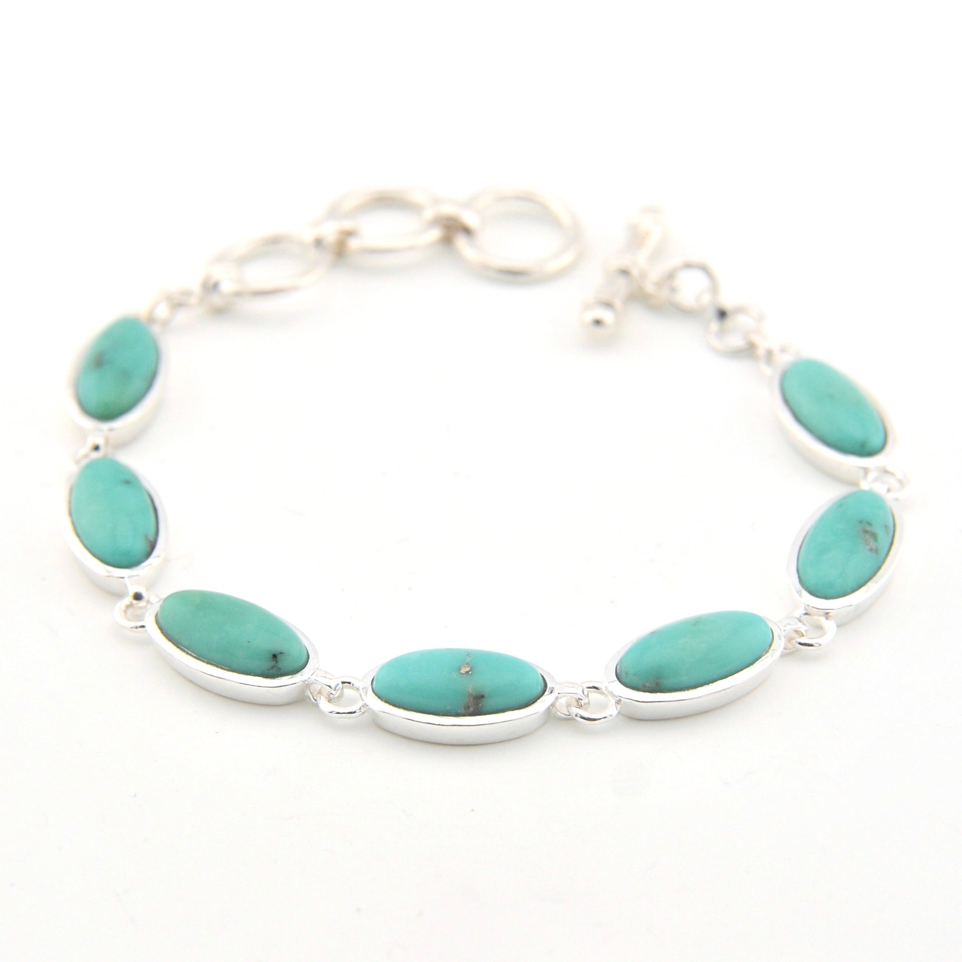 Turquoise stone bracelet on a white background