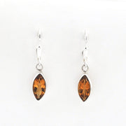 Pair of amber marquise earrings on a white background