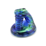 Blue and green glass object on a white background