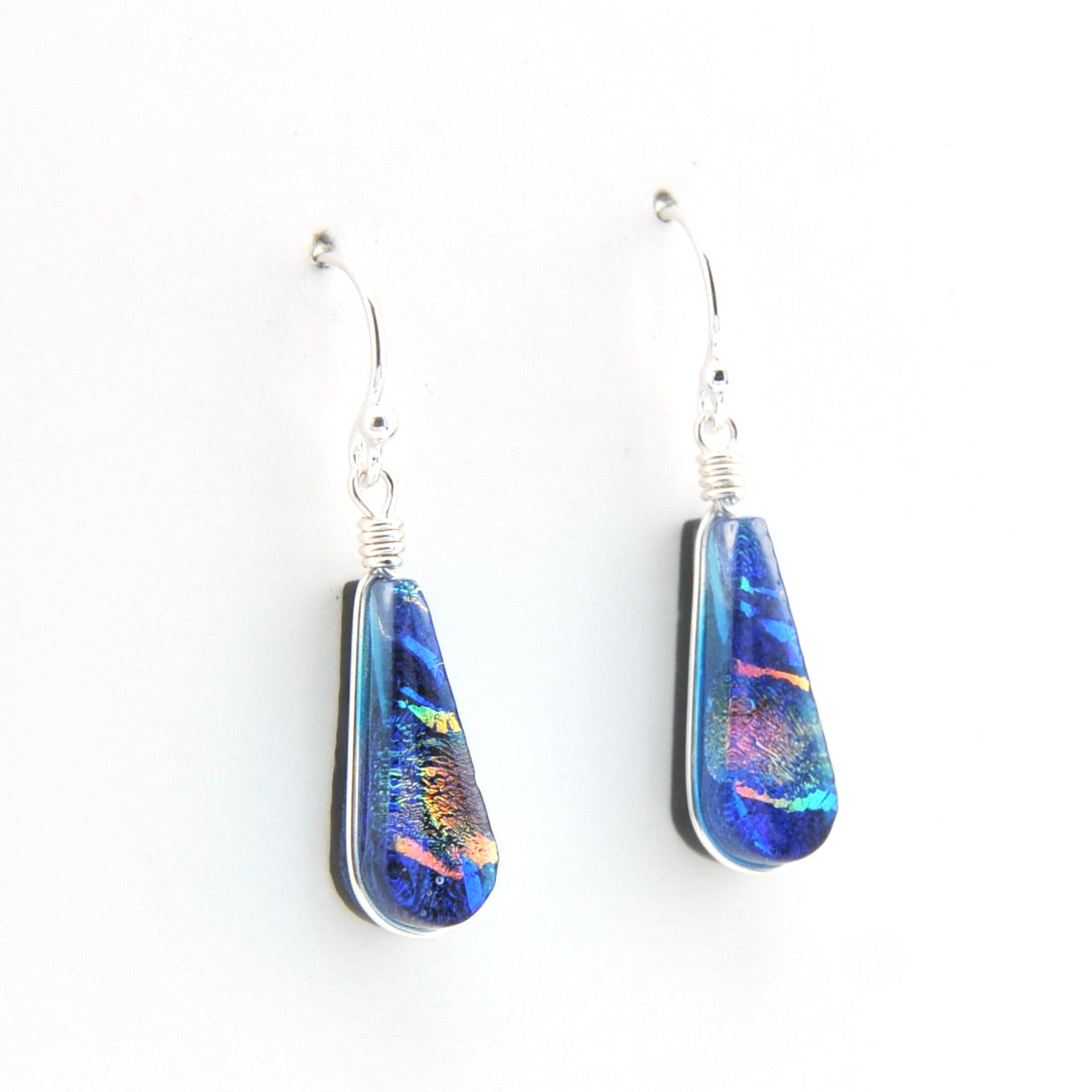 Teardrop-shaped earrings with colorful design on a white background