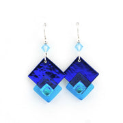 Blue square-shaped earrings with a white background