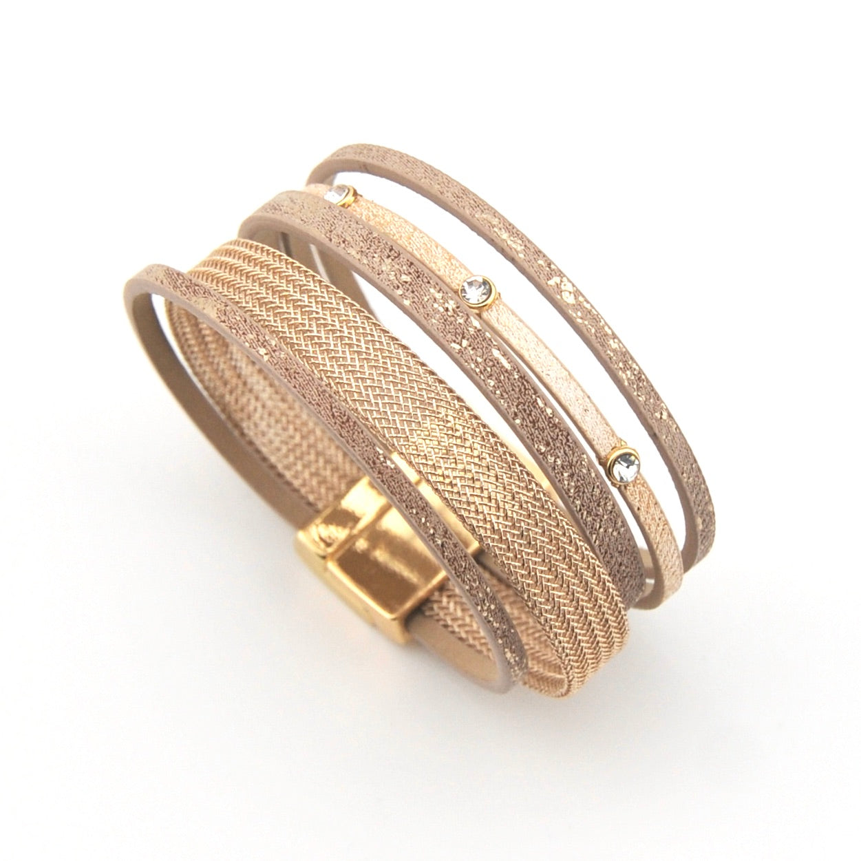 Set of gold mesh bracelets on a white background
