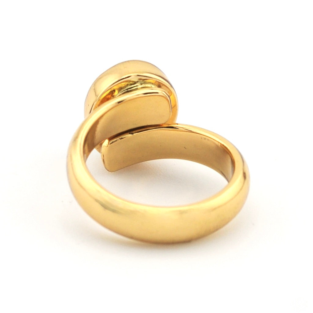 Gold ring on a white background