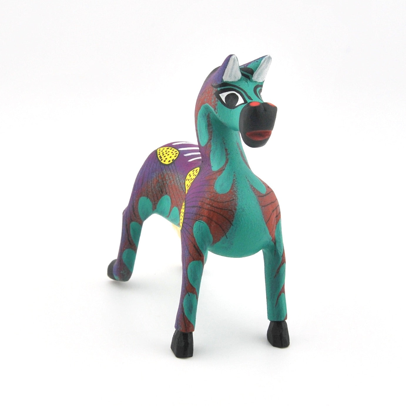 Colorful horse figurine on a white background