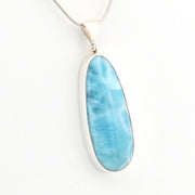 Blue pendant on a white background