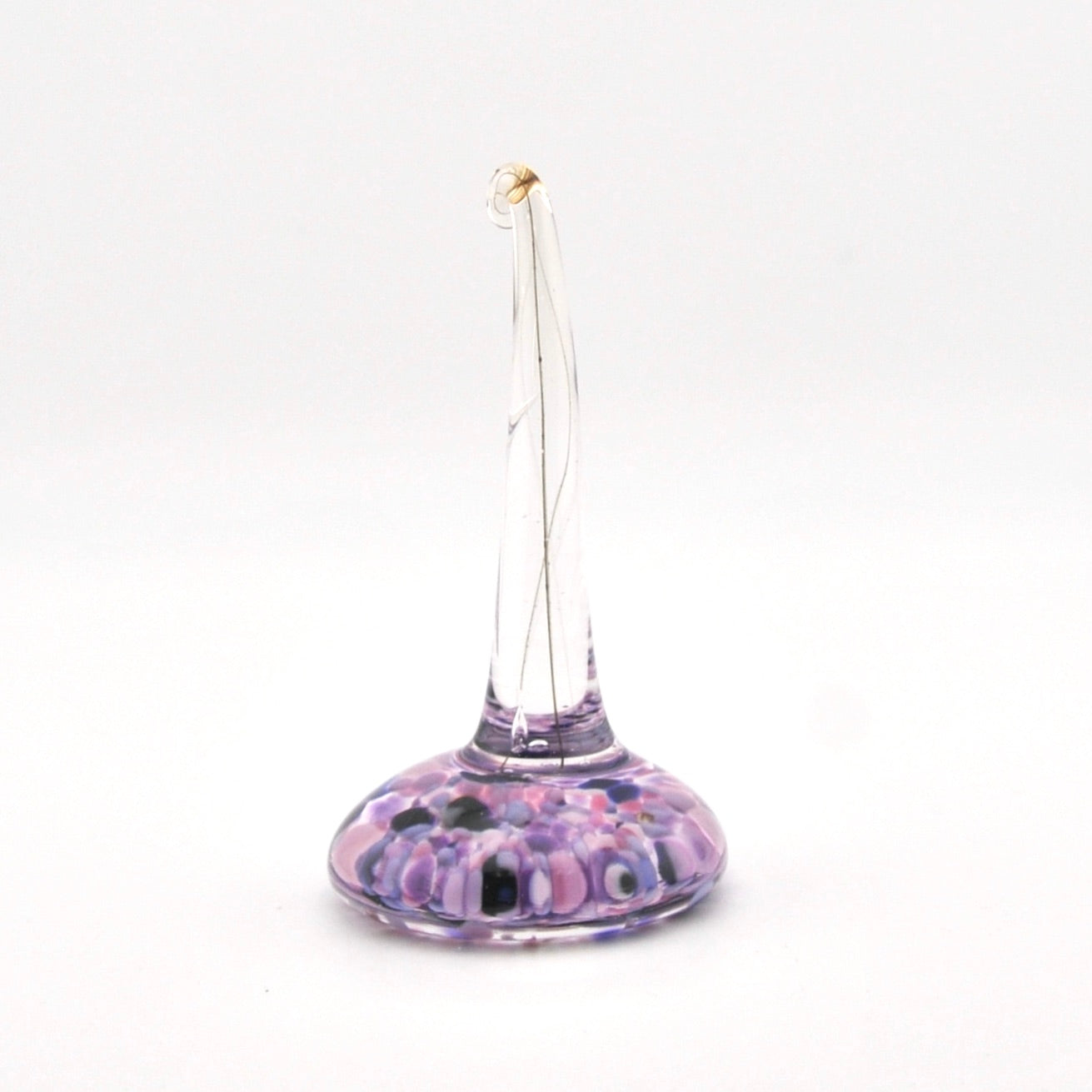 Glass ring holder on a white background