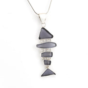 Necklace with layered gray stone pendants on a white background