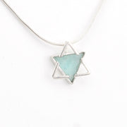 Necklace with a star-shaped pendant on a white background
