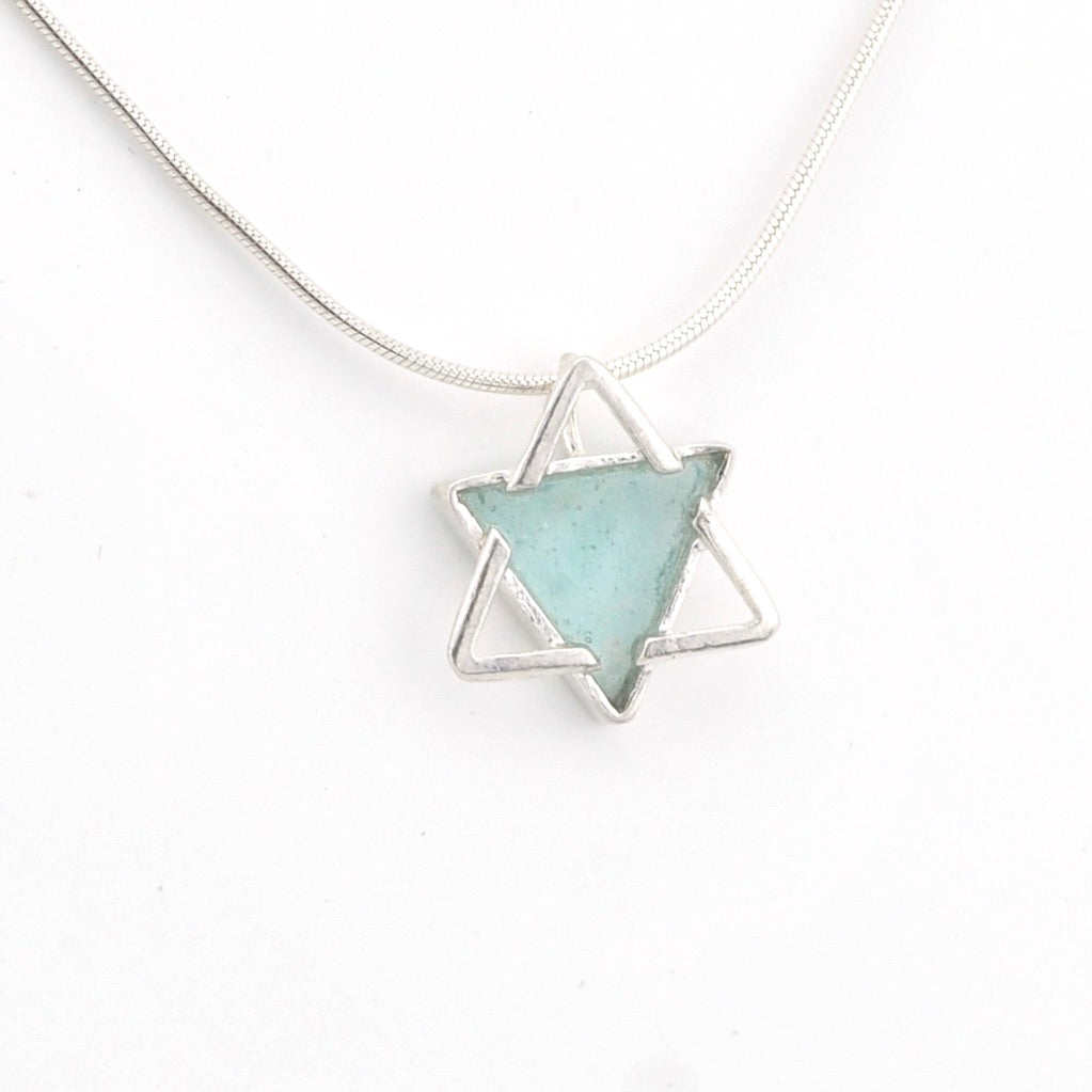 Necklace with a star-shaped pendant on a white background