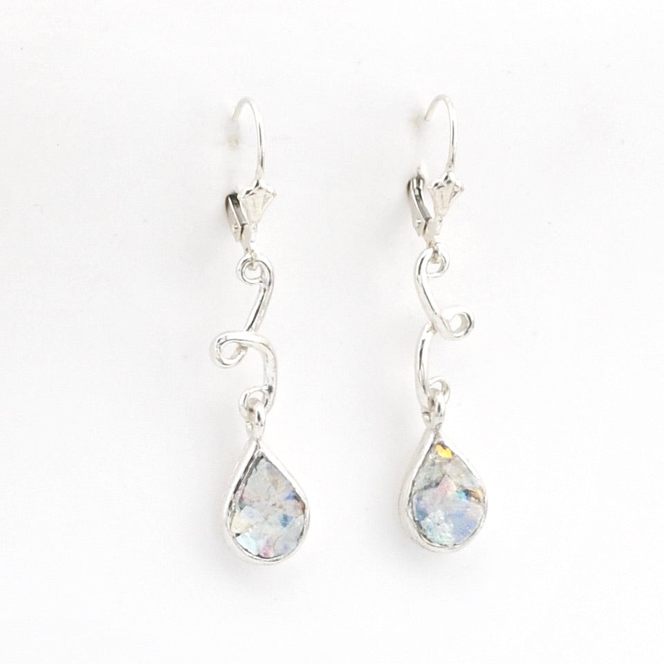 Pair of silver teardrop earrings with Roman glass on a white background