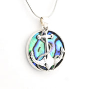 Silver pendant with abalone shell inlay on a white background