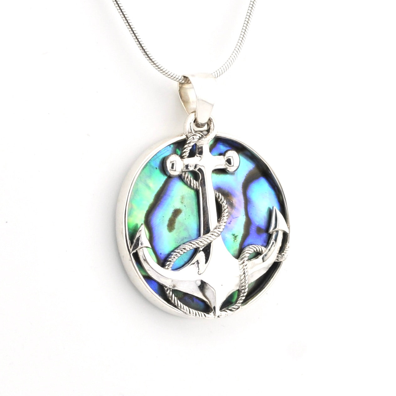 Silver pendant with abalone shell inlay on a white background