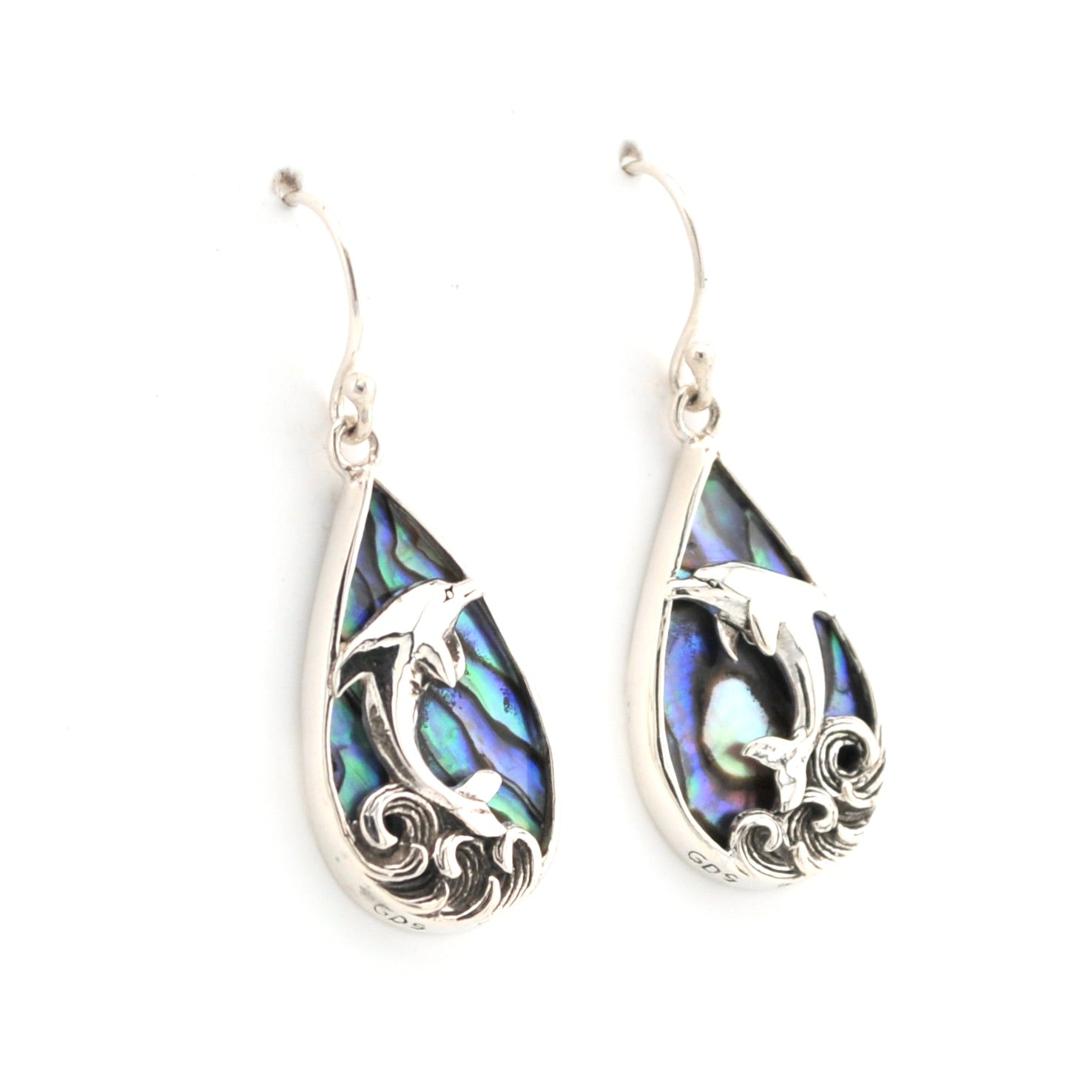 Teardrop-shaped earrings with abalone shell inlay on a white background