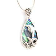 Silver pendant with abalone shell design on a white background