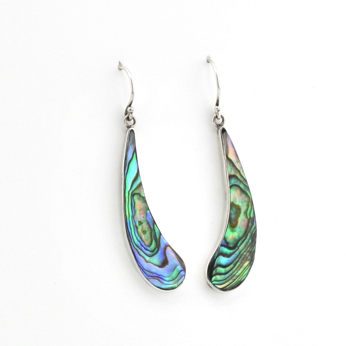 Pair of abalone shell earrings on a white background