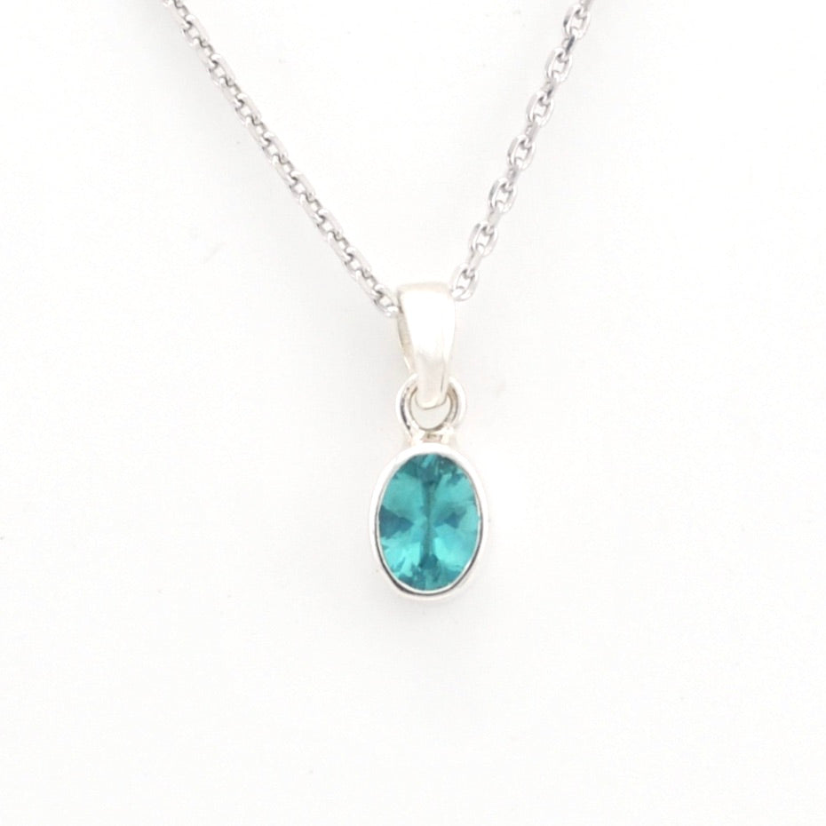 Necklace with a blue pendant on a white background