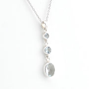 Silver Aquamarine Round Oval Necklace on white background