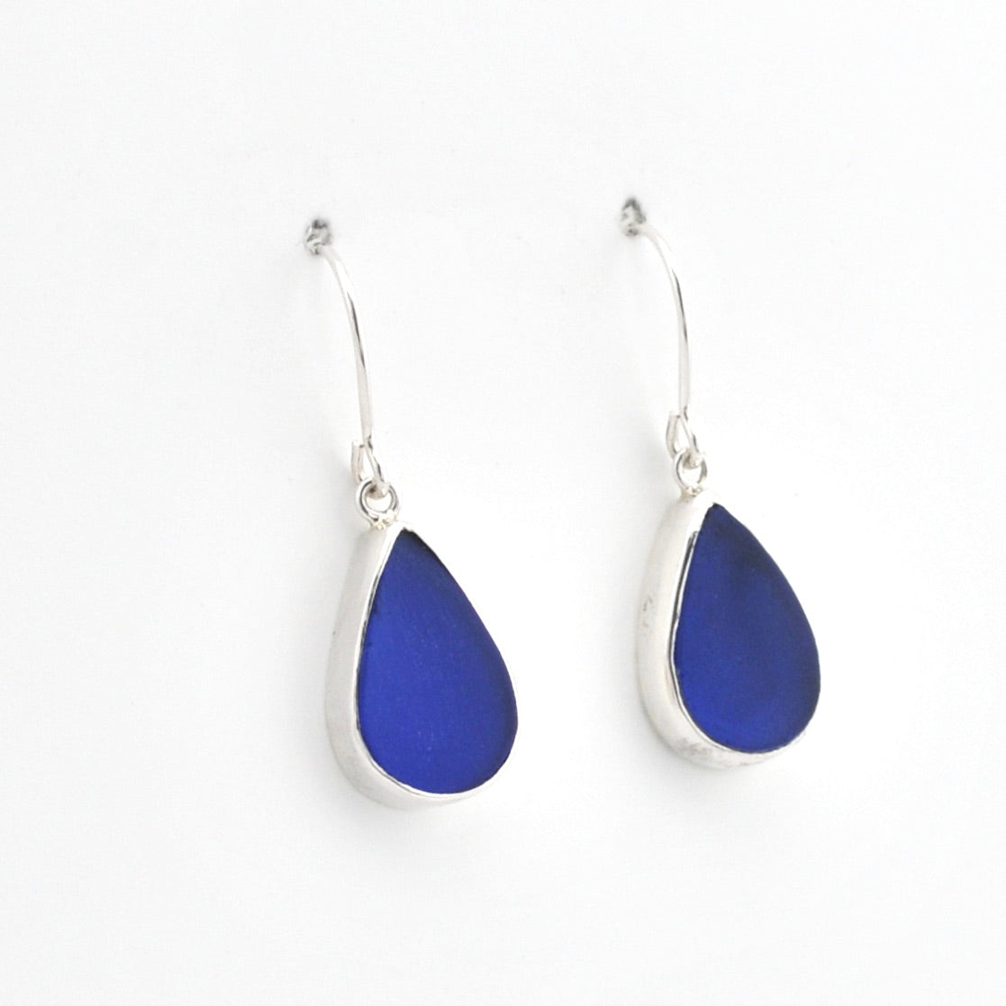 Silver Blue Sea Glass Tear Earrings on white background