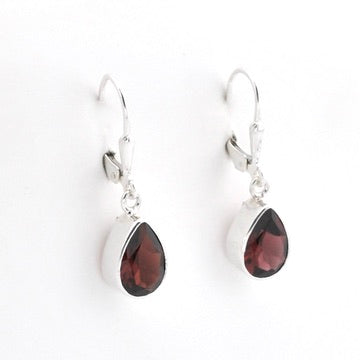 A pair of silver leverback drop earrings featuring teardrop-shaped dark brown gemstones, shown against a plain white background.