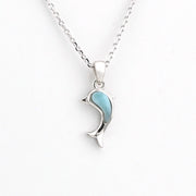 Silver necklace with a blue pendant on a white background