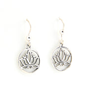 Silver lotus flower earrings on a white background