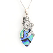 Mermaid pendant with abalone shell on a white background