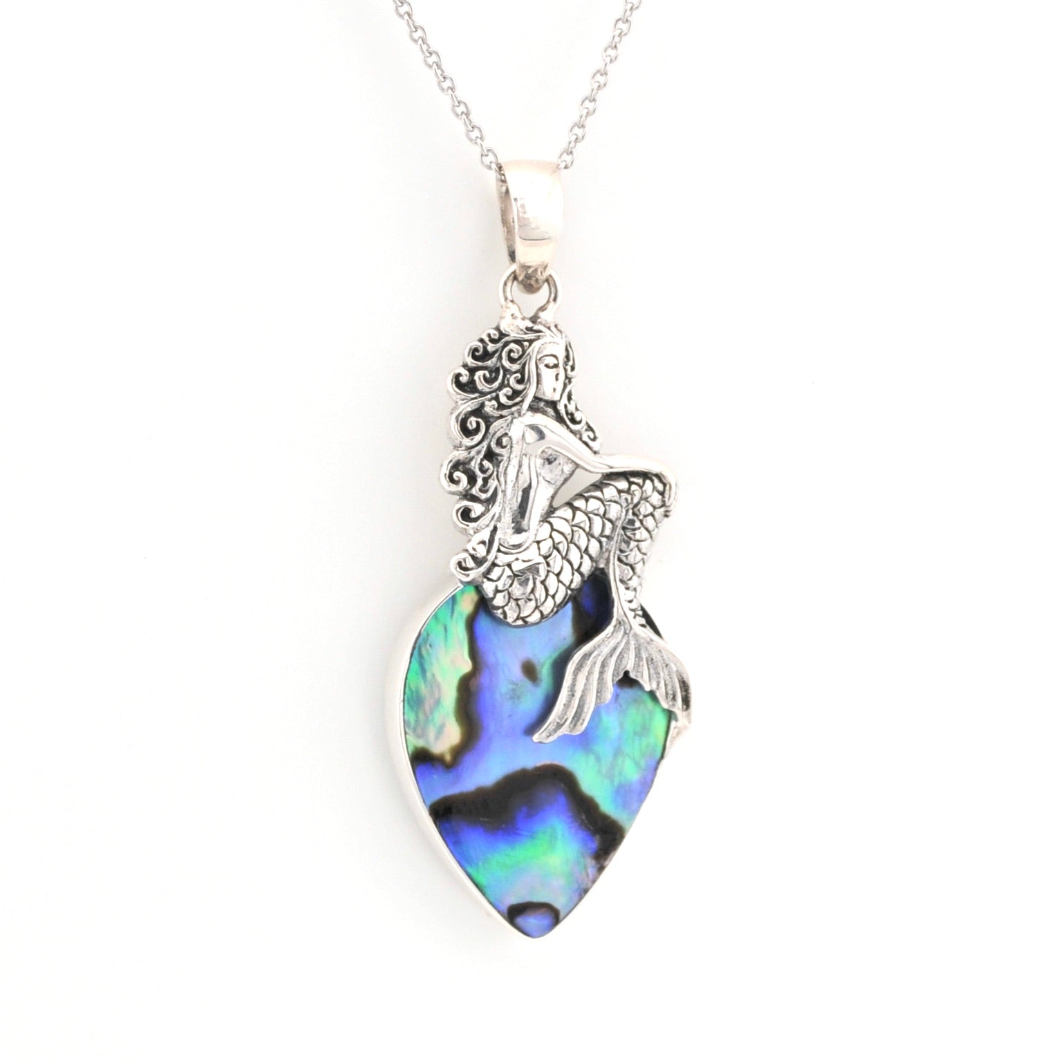 Mermaid pendant with abalone shell on a white background
