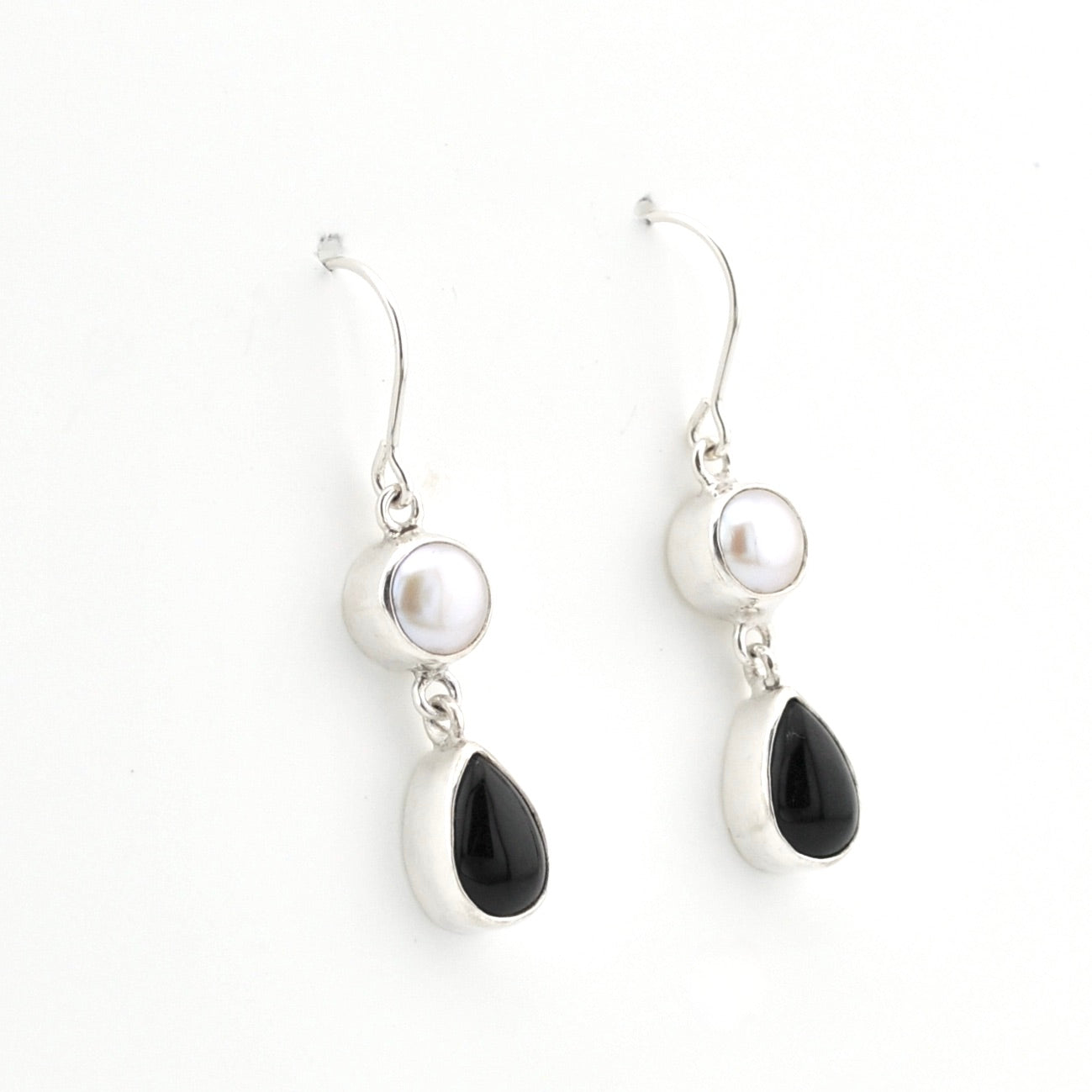 Silver Pearl Black Onyx Dangle Earrings on white background