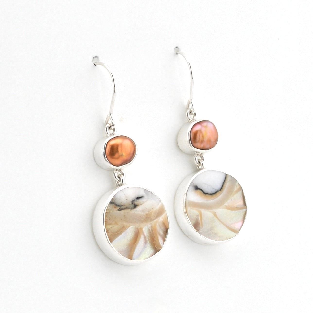Silver Pearl Nautilus Shell Dangle Earrings on white background