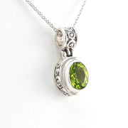 Alternate View Silver Peridot 7x9mm Oval Bali Scroll Necklace