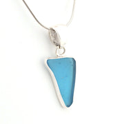 Blue pendant necklace on a white background